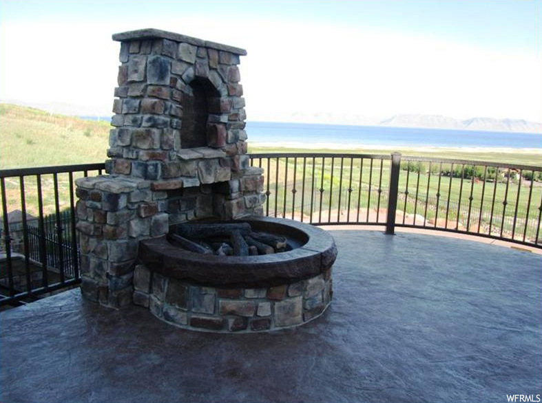 View of terrace featuring fire pit