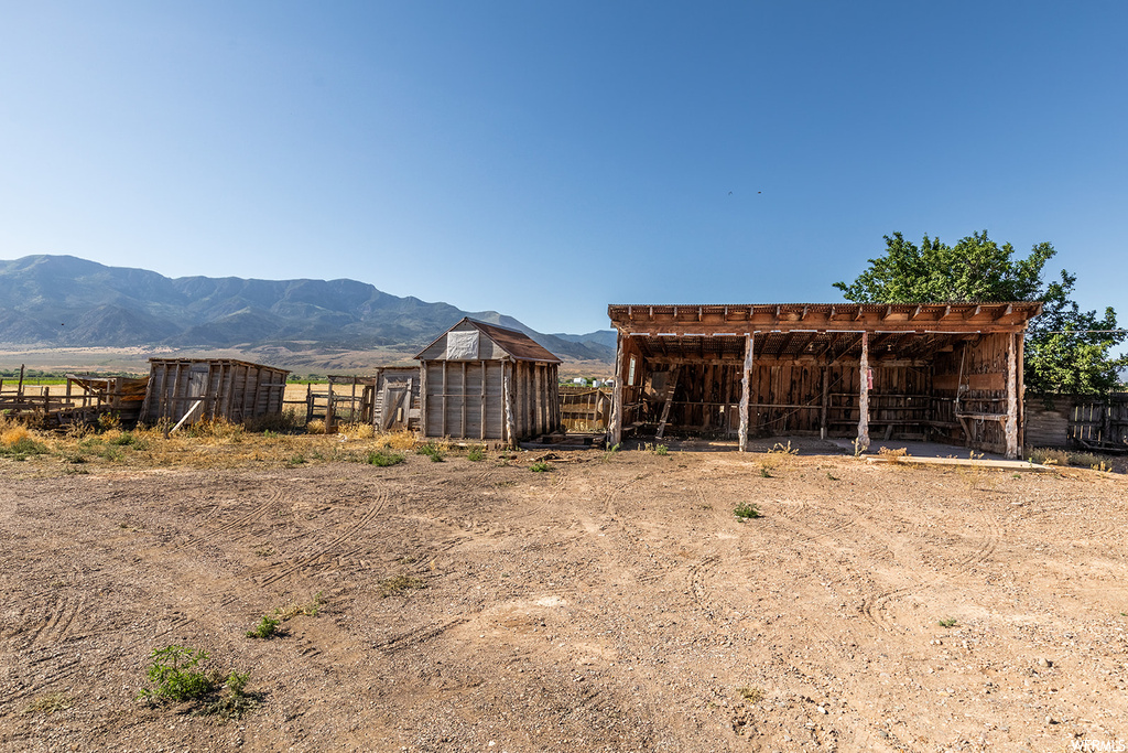 Exterior space featuring a pergola and a mountain view