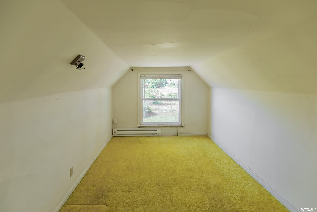 Bonus room with natural light and lofted ceiling