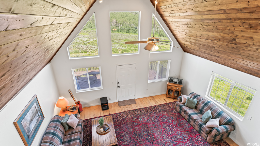 Interior space featuring lofted ceiling and natural light