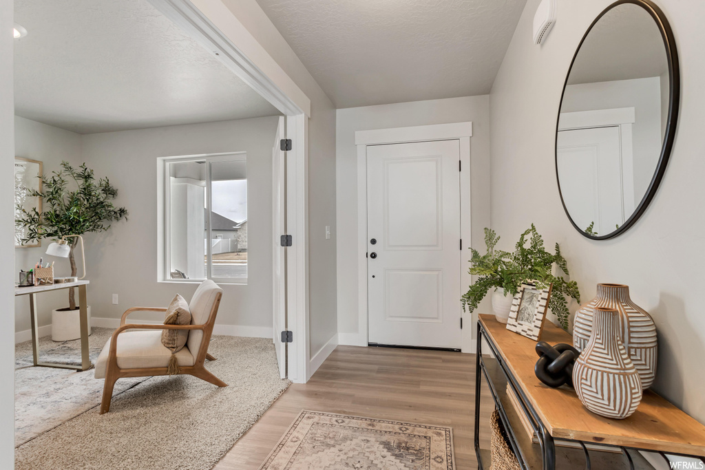 View of wood floored foyer
