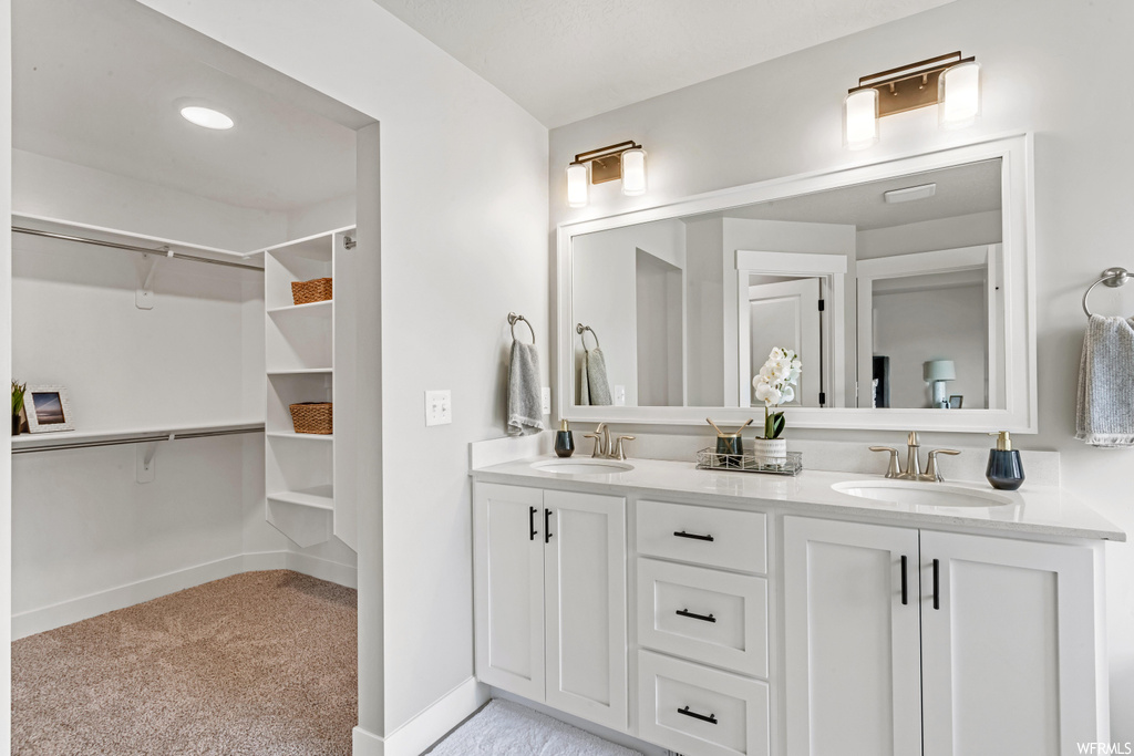 Bathroom with dual large bowl vanity and mirror