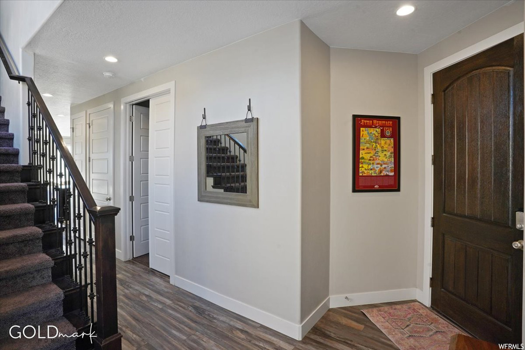 View of wood floored entrance foyer