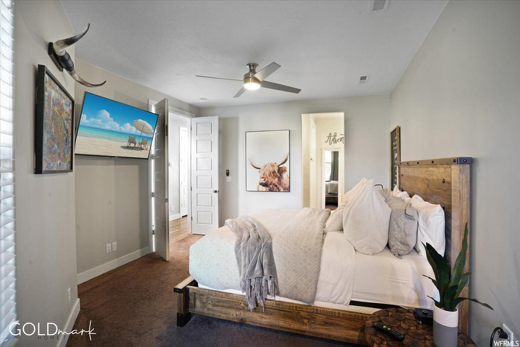 Bedroom featuring a ceiling fan and TV