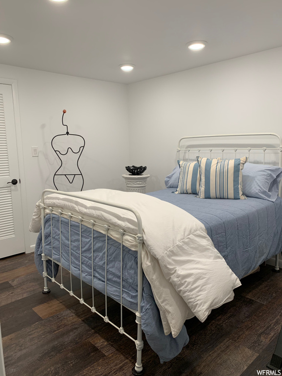 Bedroom featuring hardwood flooring