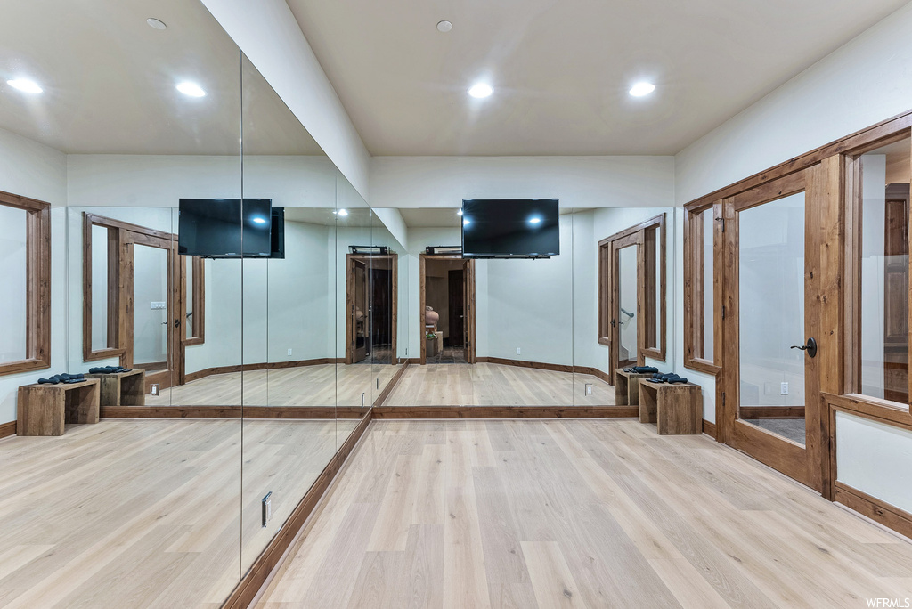 Interior space featuring TV and light parquet floors