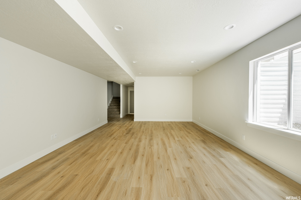 View of wood floored empty room