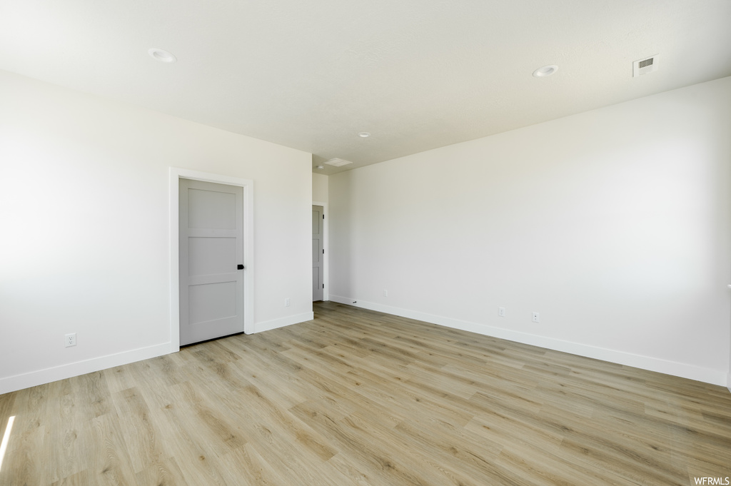 View of hardwood floored empty room