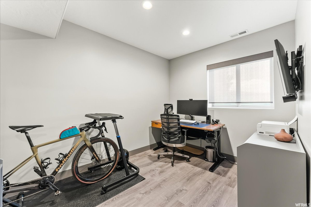 Office space featuring light hardwood floors