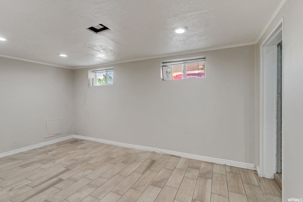 Interior space featuring crown molding
