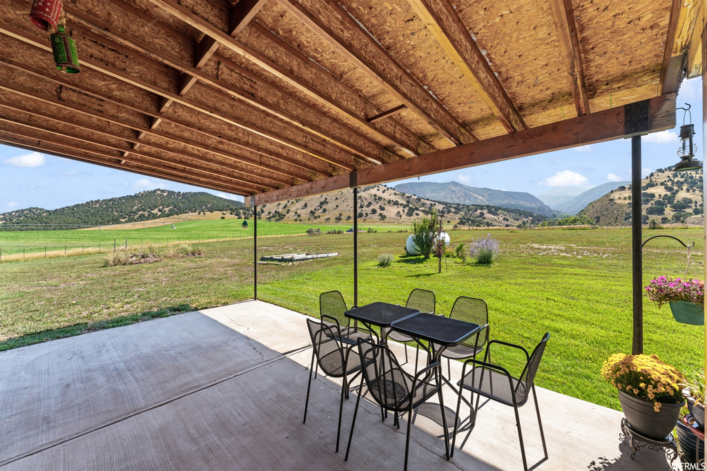 View of patio featuring a mountain view
