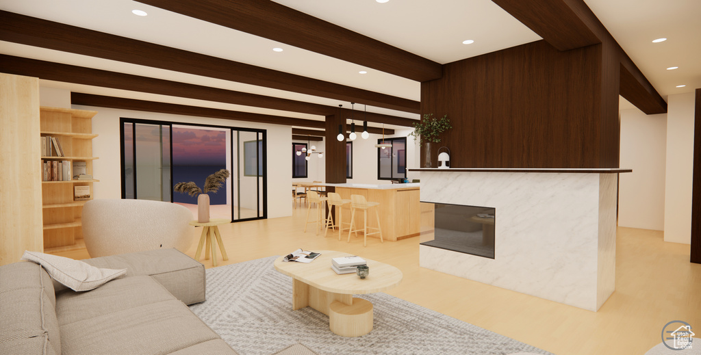 Living room with light hardwood / wood-style flooring and beamed ceiling
