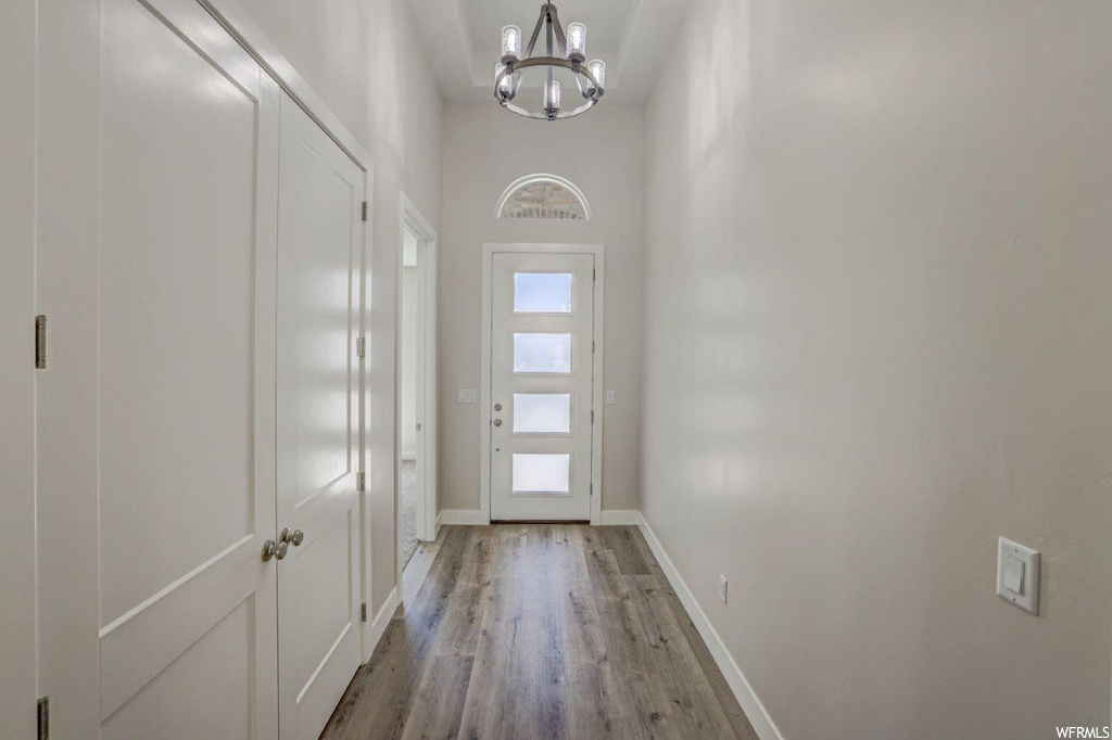 Doorway featuring light hardwood flooring