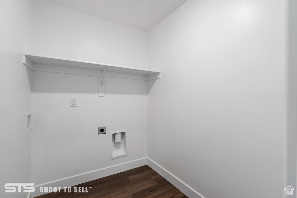 Washroom featuring washer hookup, dark hardwood / wood-style floors, and electric dryer hookup