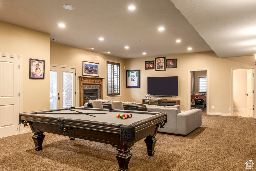 Rec room with light colored carpet and billiards