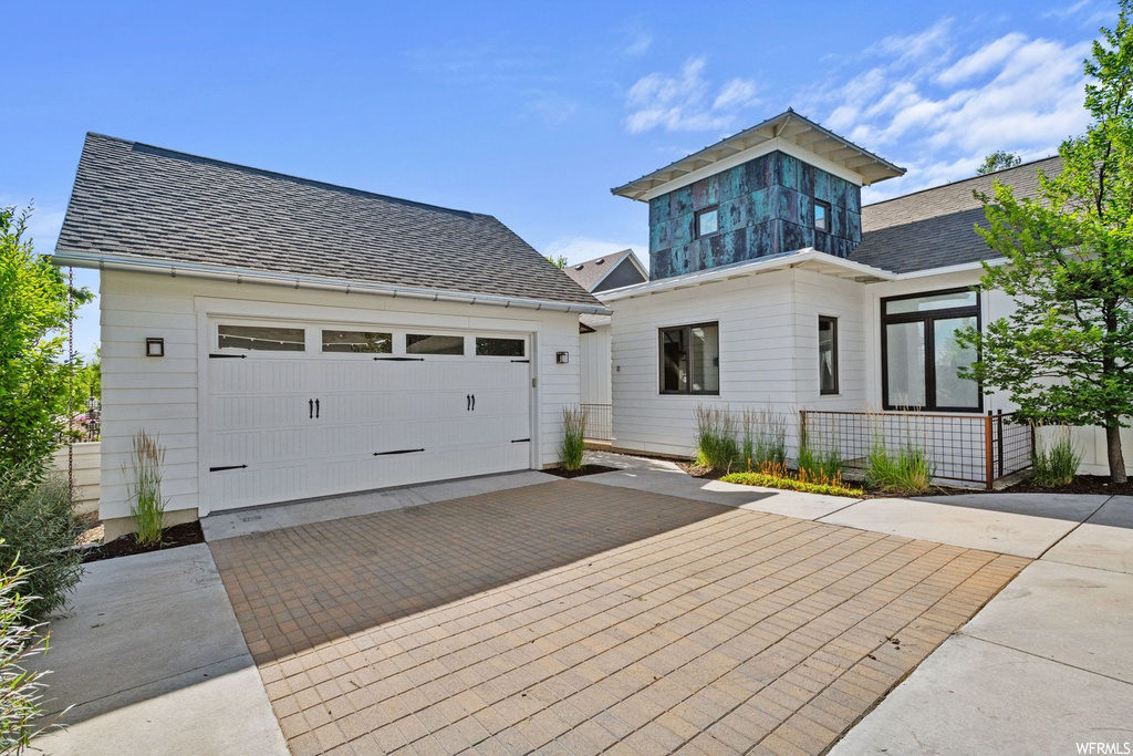 Contemporary home featuring garage