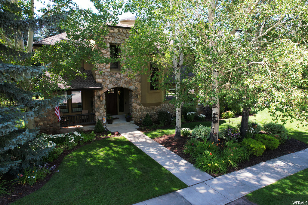 View of front of home with a front yard