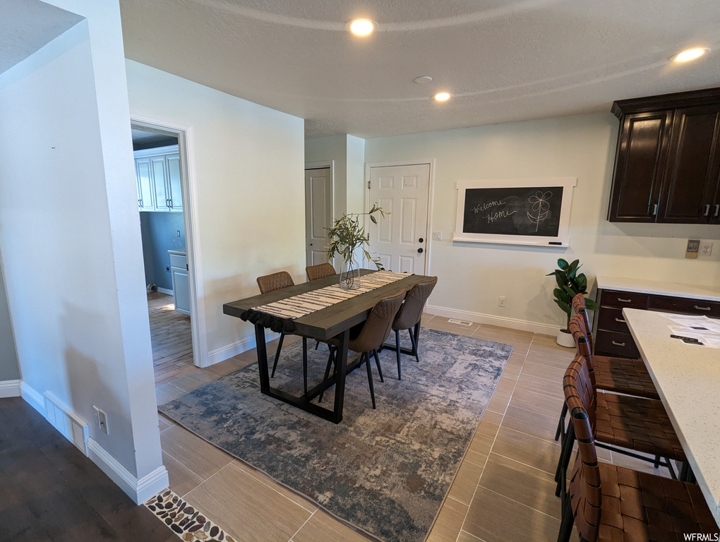 Dining area featuring tile floors