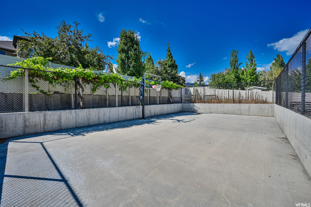 Exterior space with basketball court