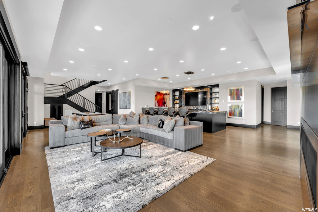 Living room featuring light parquet floors
