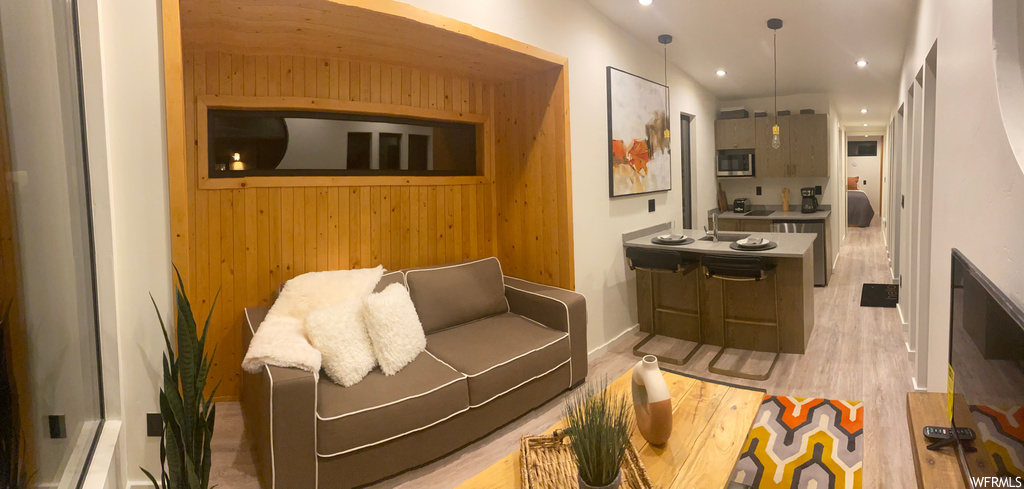 Living room featuring light hardwood floors