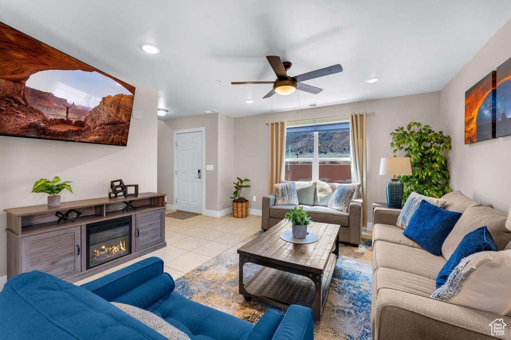 Tiled living room with ceiling fan