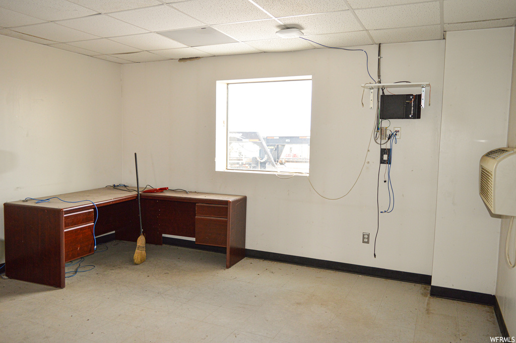 Office space featuring a drop ceiling