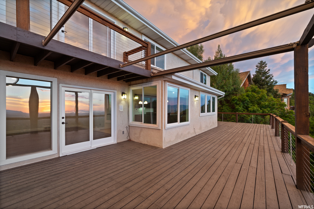 View of deck at dusk