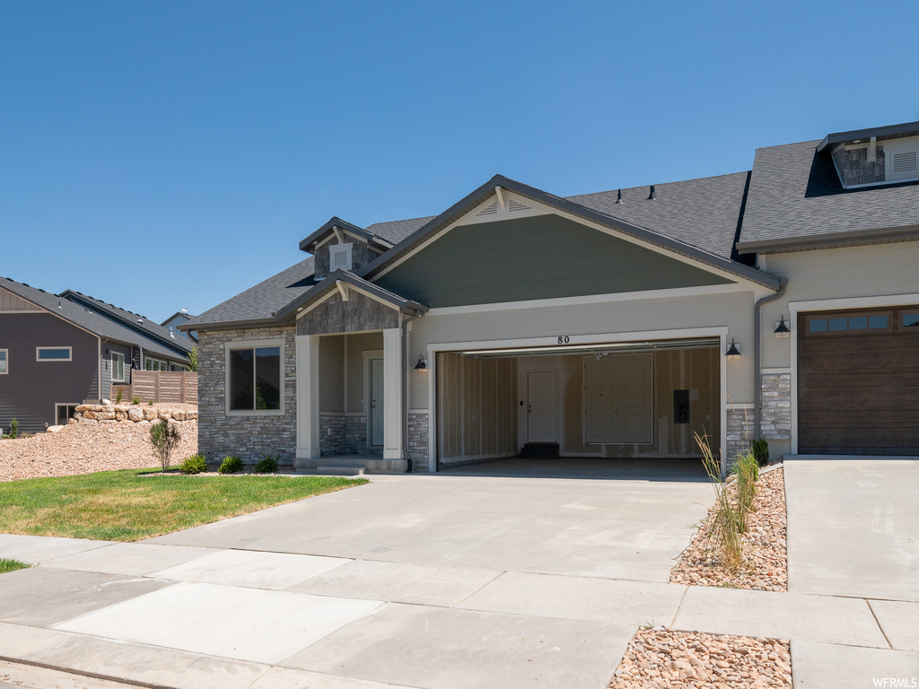 View of craftsman inspired home