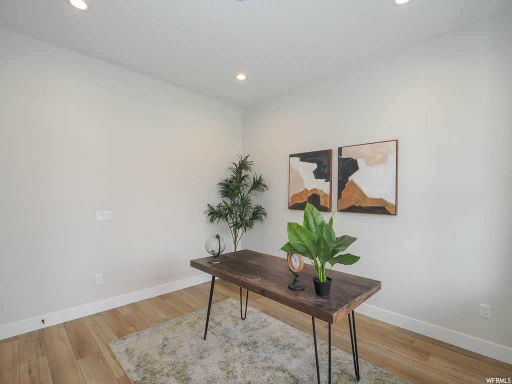 Office featuring light hardwood flooring