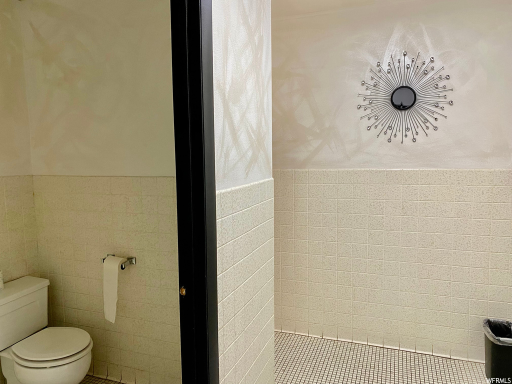 Bathroom with tile walls