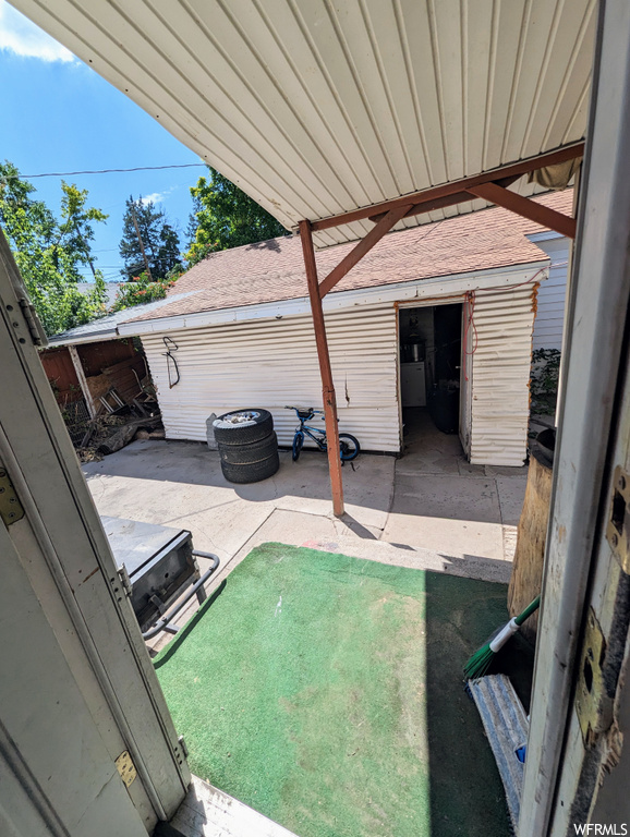 View of yard with a patio