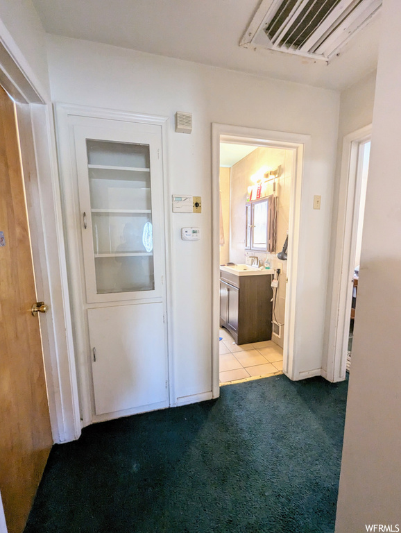 Corridor with dark carpet