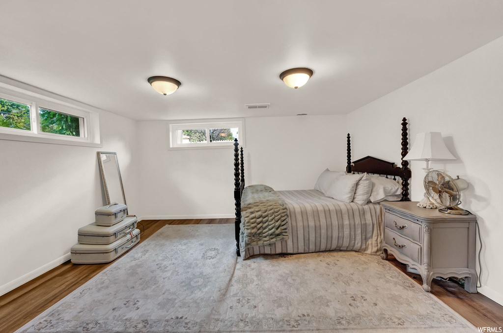 Bedroom featuring light parquet floors