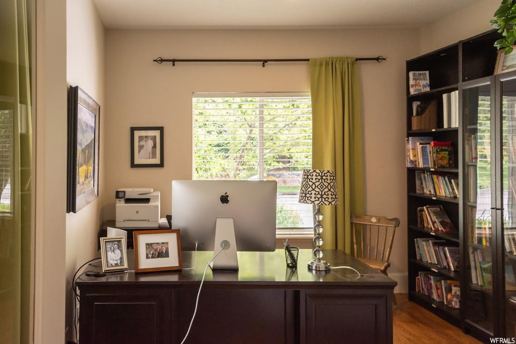View of hardwood floored office