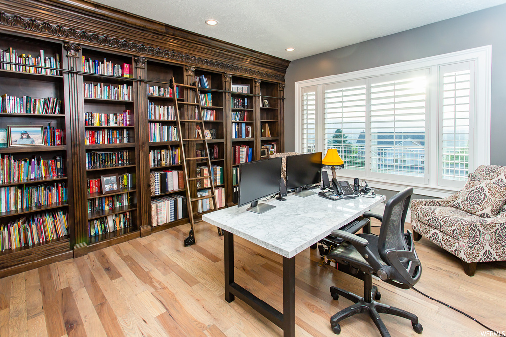 View of wood floored home office