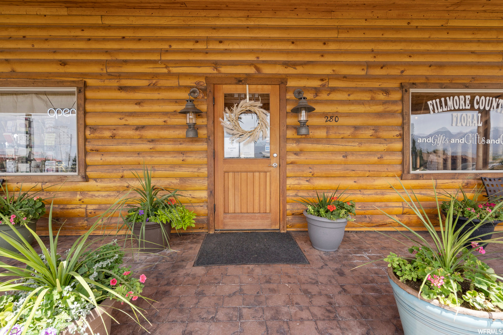Property entrance with a porch