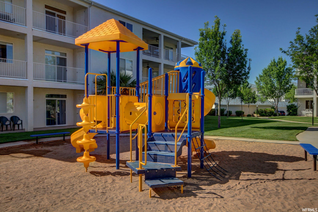 View of jungle gym featuring a yard