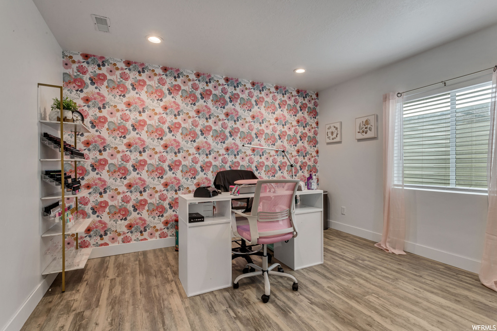 Office area with light parquet floors