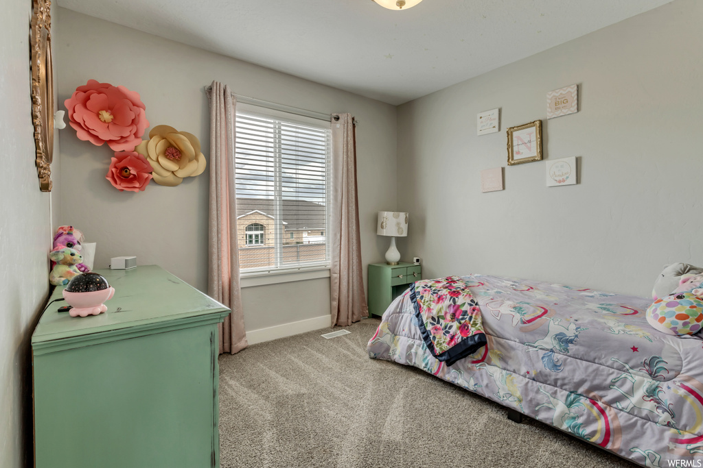 View of carpeted bedroom