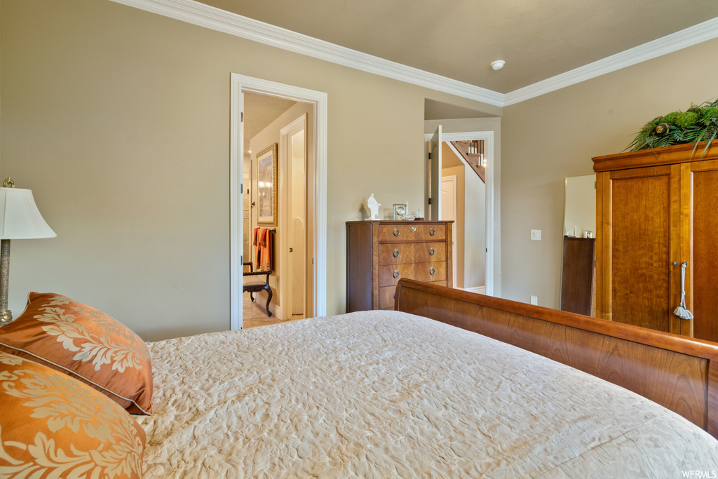 Bedroom featuring ornamental molding