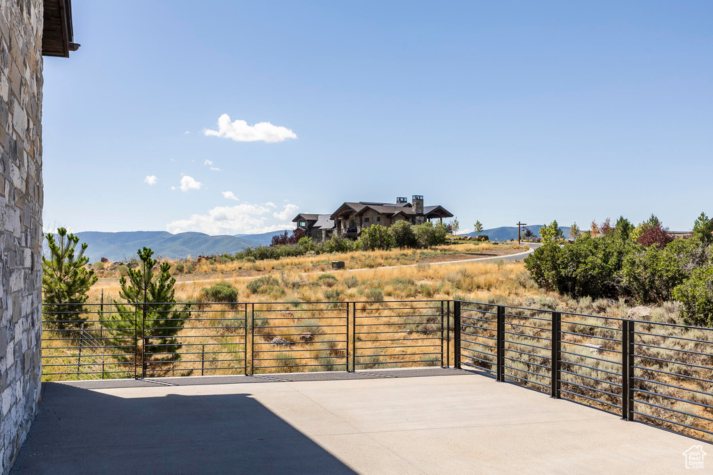 View of patio / terrace featuring a mountain view