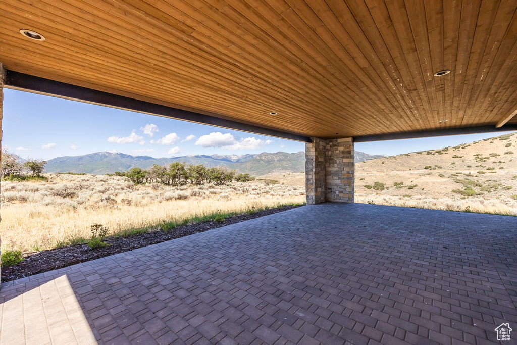 View of patio featuring a mountain view