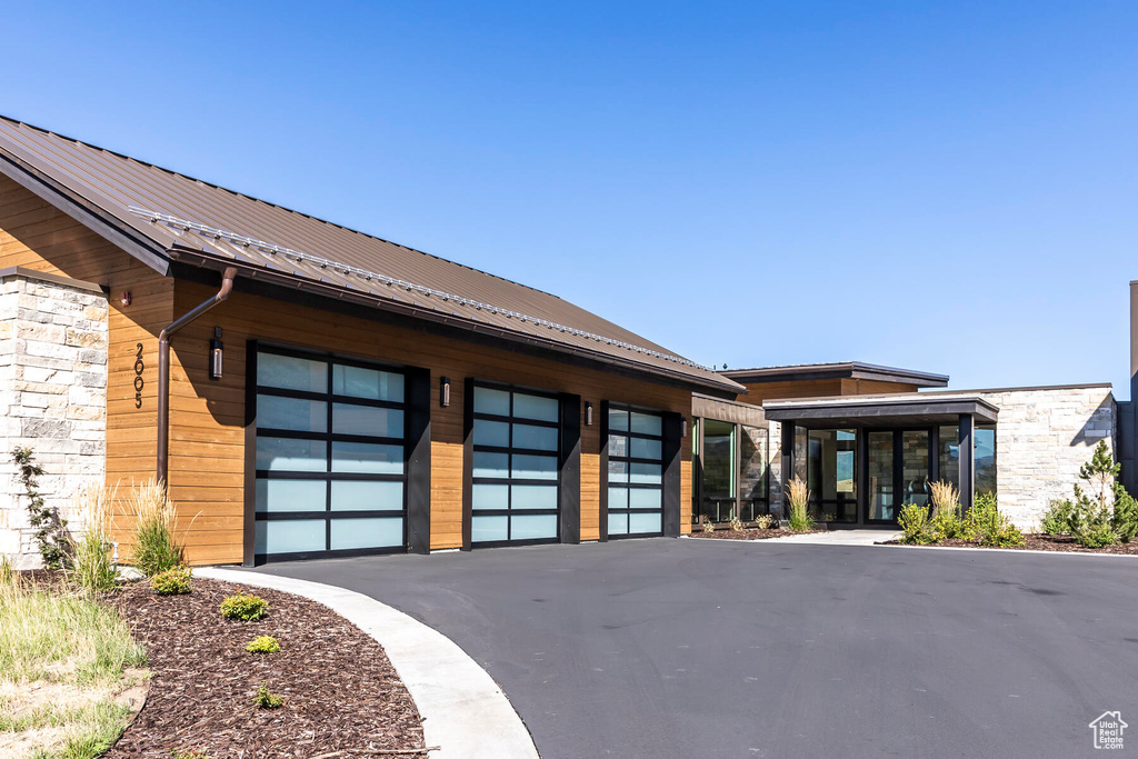 View of front of home with a garage