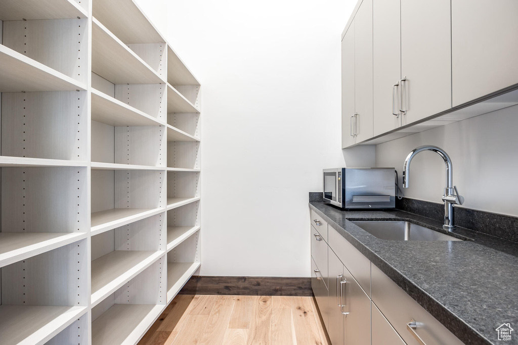 Pantry featuring sink