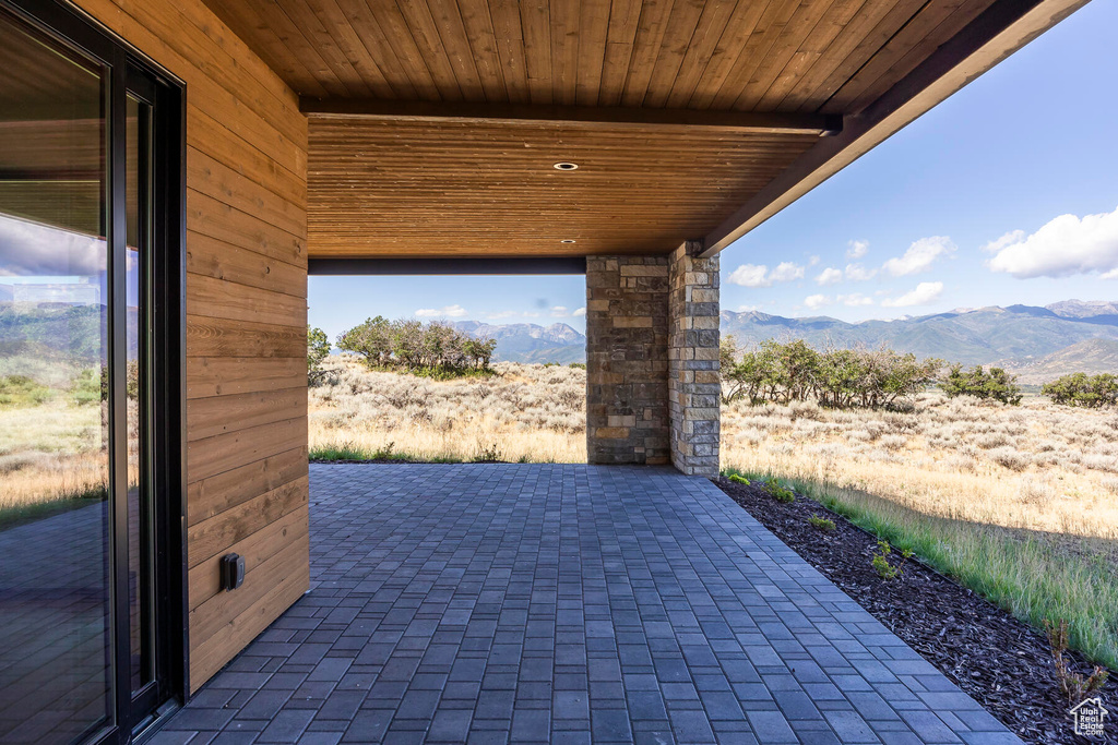 View of patio with a mountain view