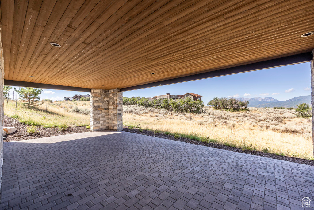 View of patio / terrace featuring a mountain view