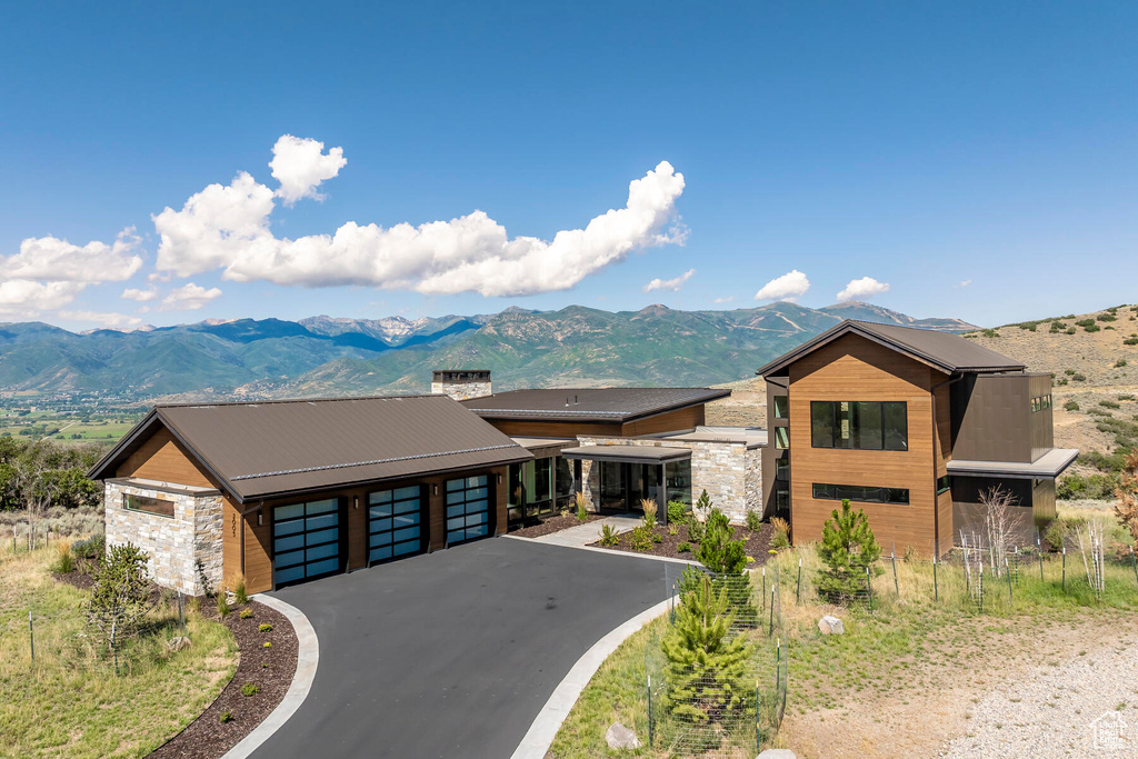 View of front of house with a mountain view