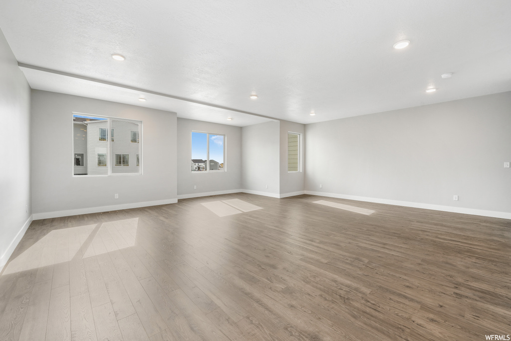 Unfurnished room featuring light hardwood floors