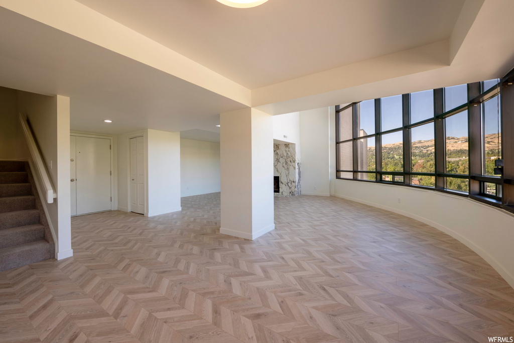 Interior space with light parquet floors